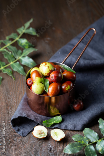 Fotografi Fresh jujube and leaves