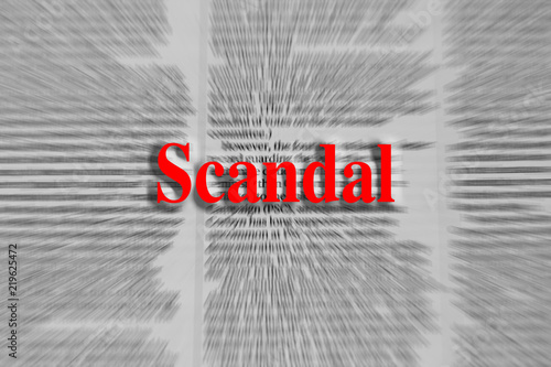 Foto Scandal written in red with a newspaper article blurred in the background