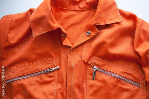 An orange jumpsuit of a prisoner. Prison clothes, prisoner overalls