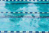swimming-pool with blue water for sporting swimming with tracks