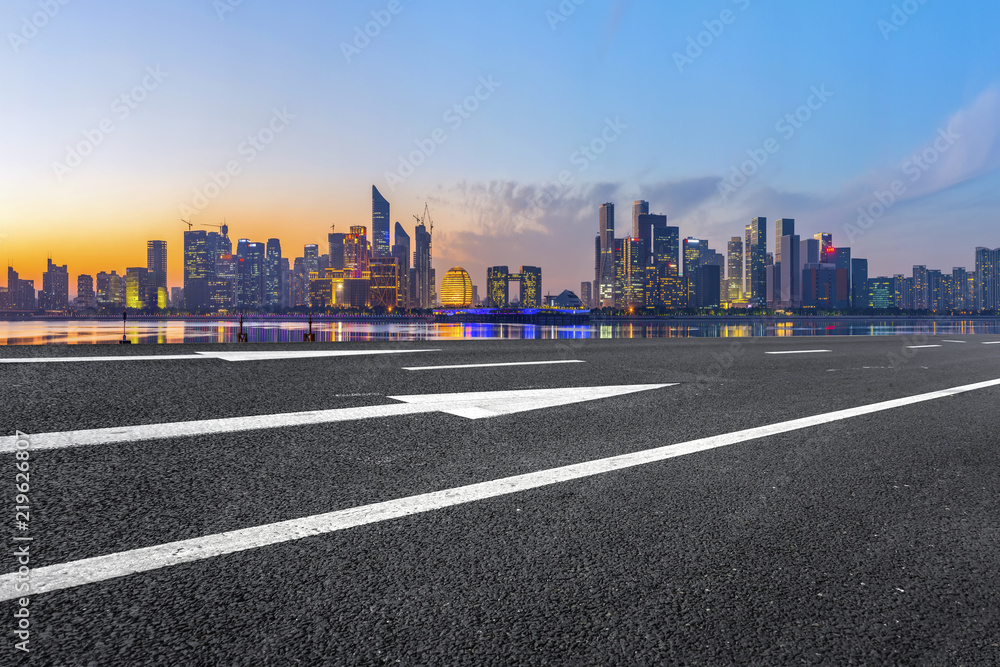 Urban road asphalt pavement and skyline of Hangzhou architectural landscape Urban road asphalt pavement and skyline of Hangzhou architectural landscape