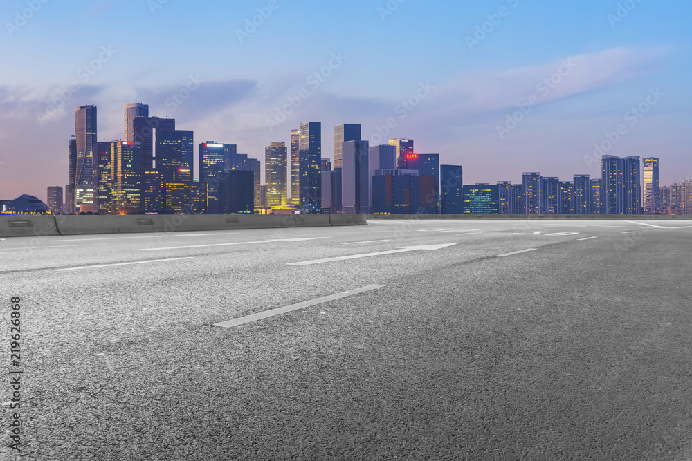 Urban road asphalt pavement and skyline of Hangzhou architectural landscape Urban road asphalt pavement and skyline of Hangzhou architectural landscape