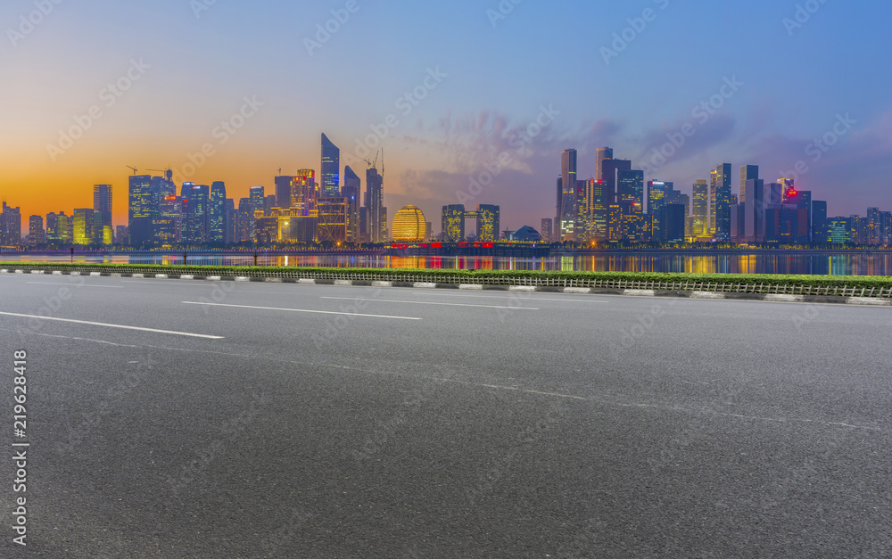 Urban road asphalt pavement and skyline of Hangzhou architectural landscape Urban road asphalt pavement and skyline of Hangzhou architectural landscape