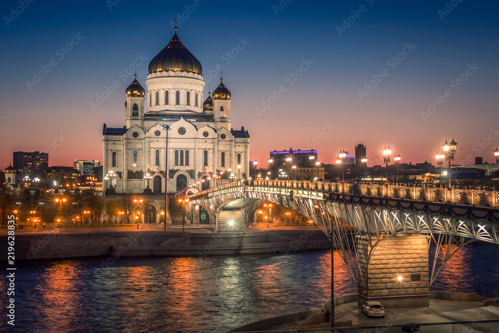 Moscow, Russia. View of the Patriarchal bridge and the Cathedral of Christ the Savior in an evening illumination.