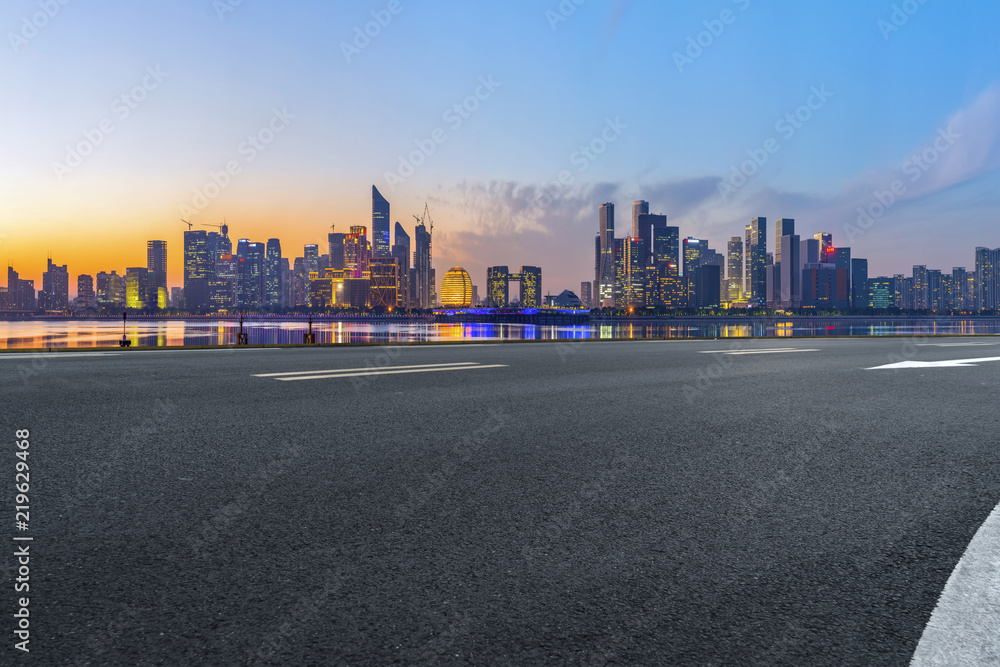Urban road asphalt pavement and skyline of Hangzhou architectural landscape Urban road asphalt pavement and skyline of Hangzhou architectural landscape