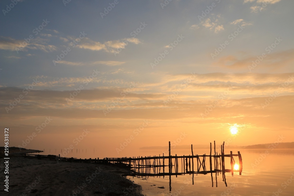 seascape at sunset, burial at sea StockFoto Adobe Stock