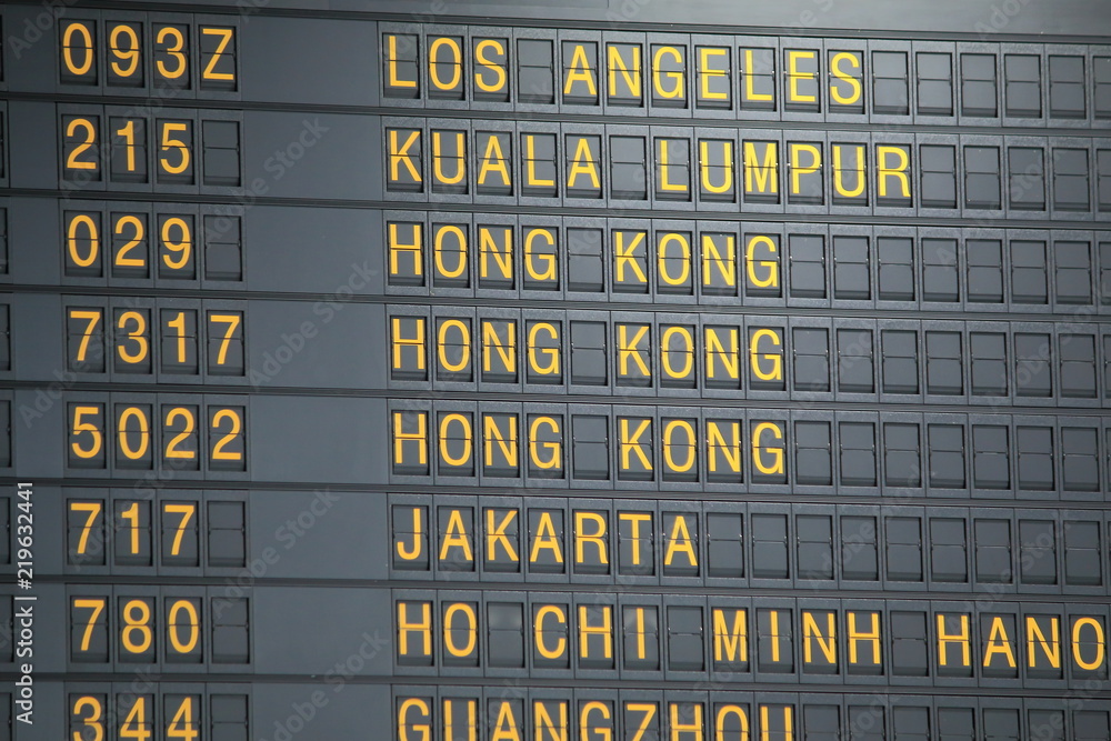 Airport departure board showing flight information Stock Photo | Adobe