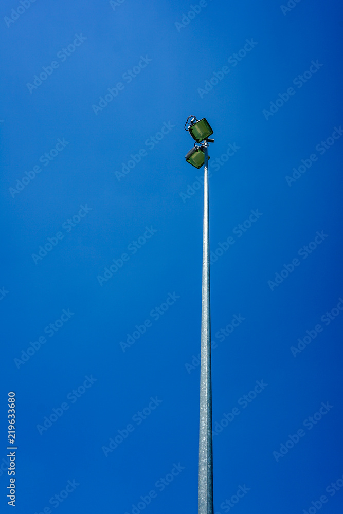 light pole from stadium with clear blue sky light pole from stadium with clear blue sky