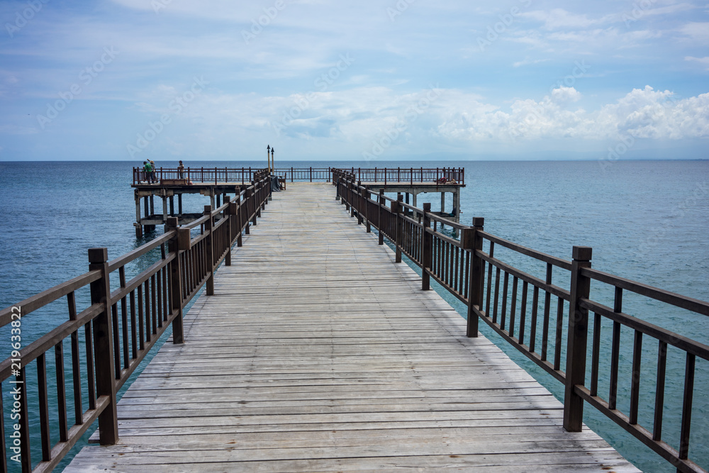 empty wood pier and full ocean view