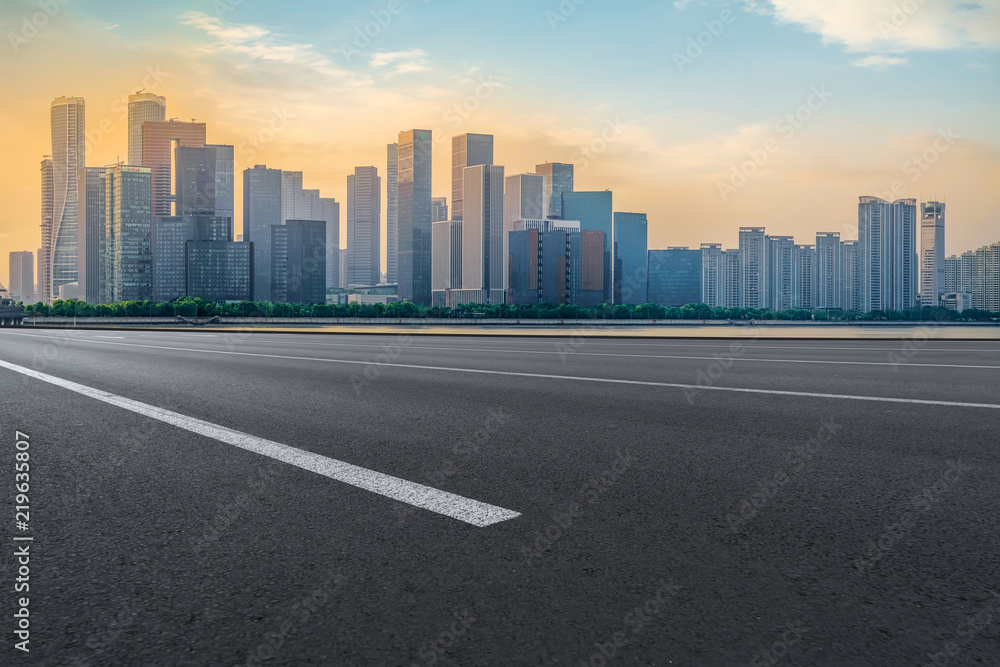 Urban road asphalt pavement and skyline of Hangzhou architectural landscape Urban road asphalt pavement and skyline of Hangzhou architectural landscape