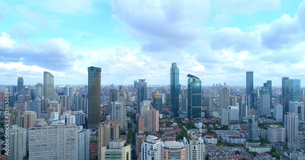Aerial image showing cityscape of modern megacity with densely populated build environment, dominated by high-rise buildings. 08.19.2018. Shanghai, China. Aerial image showing cityscape of modern megacity with densely populated build environment, dominated by high-rise buildings. 08.19.2018. Shanghai, China.