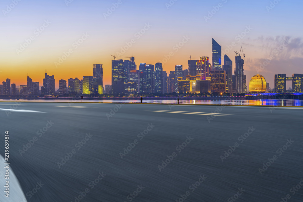 Urban road asphalt pavement and skyline of Hangzhou architectural landscape Urban road asphalt pavement and skyline of Hangzhou architectural landscape