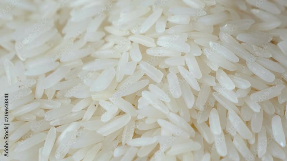 Motion video of close up raw rice / uncook rice. Motion video of close up raw rice / uncook rice.