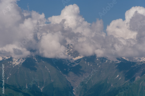Mountain peaks in the clouds © Maks_Ershov