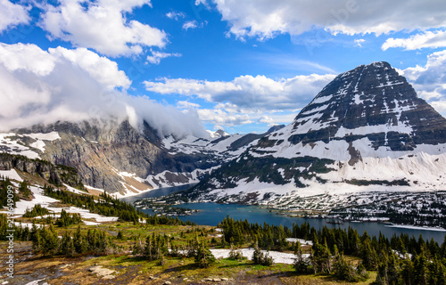 Panorama of high mountain lake - Hidden Lake in the rocky mountains of Glacier National Park Montana photo