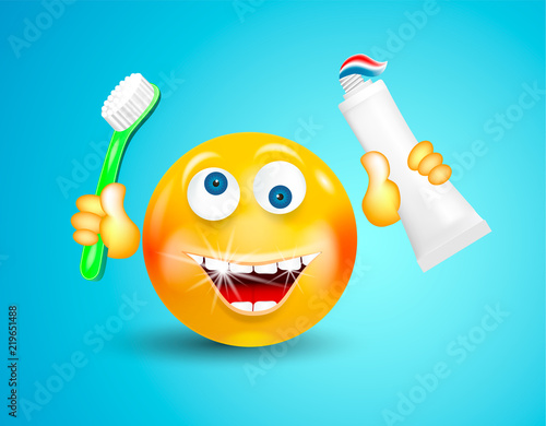 Happy smiling with white shining teeth emoticon or round face holding toothbrush and toothpaste in its hands on bright blue background. Cartoon character. Concept of healthy lifestyle and cleanliness.