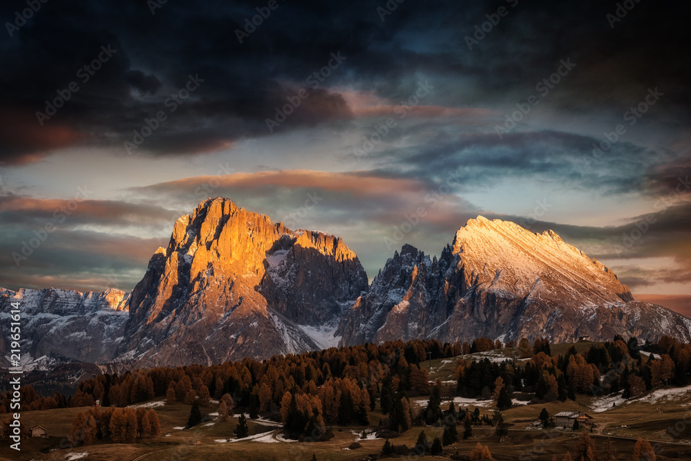 Alpe di Siusi - Seiser Alm with Sassolungo - Langkofel mountain group in background at sunset