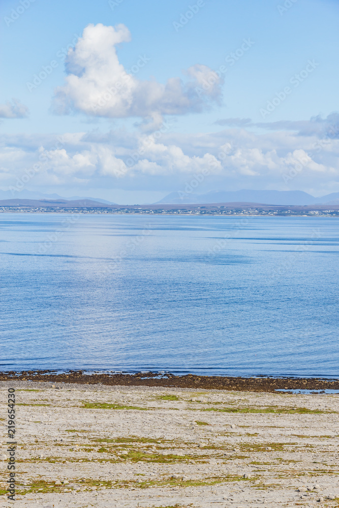 Obraz premium Fanore beach in Burren mountain with Galway bay in background