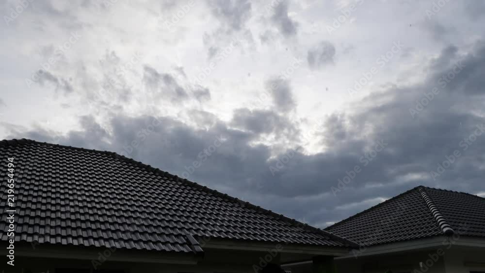 cloudy sky in rainy day scene, water pouring rain falling on roof house cloudy sky in rainy day scene, water pouring rain falling on roof house