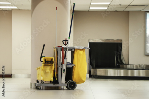 cleaning tools cart wait for cleaning.bucket and set of cleaning equipment in the airport .selective focus