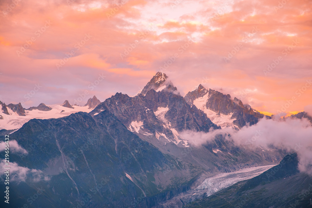 Cloudy Sunset over Iconic Mont-Blanc Mountains Range and Glaciers.