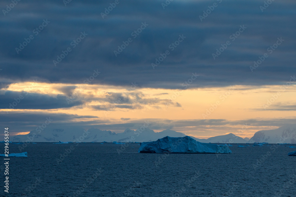 ice in the Antarctica with iceberg in the ocean