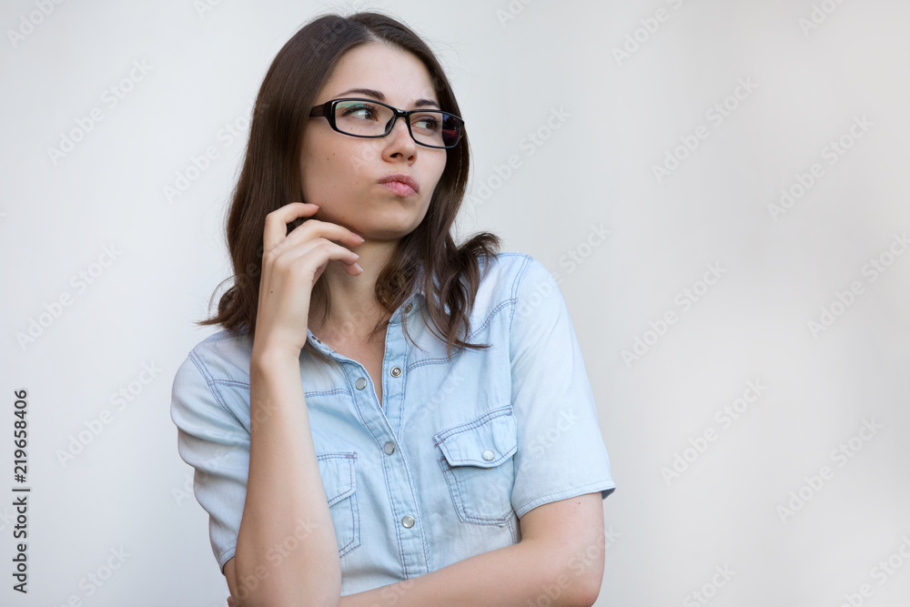 Eyeglasses for good vision, young woman grimacing with glasses