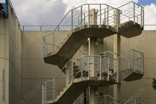 A stairway to a parking lot