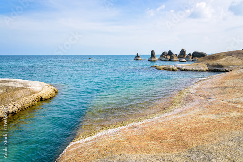 Beautiful natural landscape of the rock and the blue sea at coastline near the Hin Ta Hin Yai scenic view is a symbol famous tourist destinations of Koh Samui island, Surat Thani province, Thailand photo