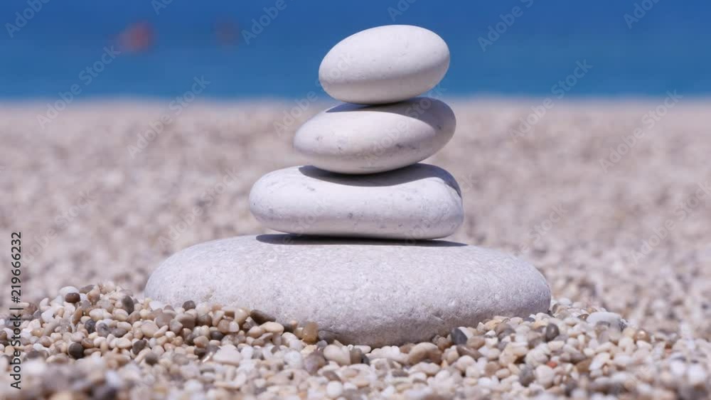 Mini Tower or Column From Small Stones on the Beach in Vacation Mini Tower or Column From Small Stones on the Beach in Vacation
