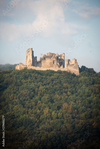Ruin of Brekov castle on top of the hill in morning light, Slovakia