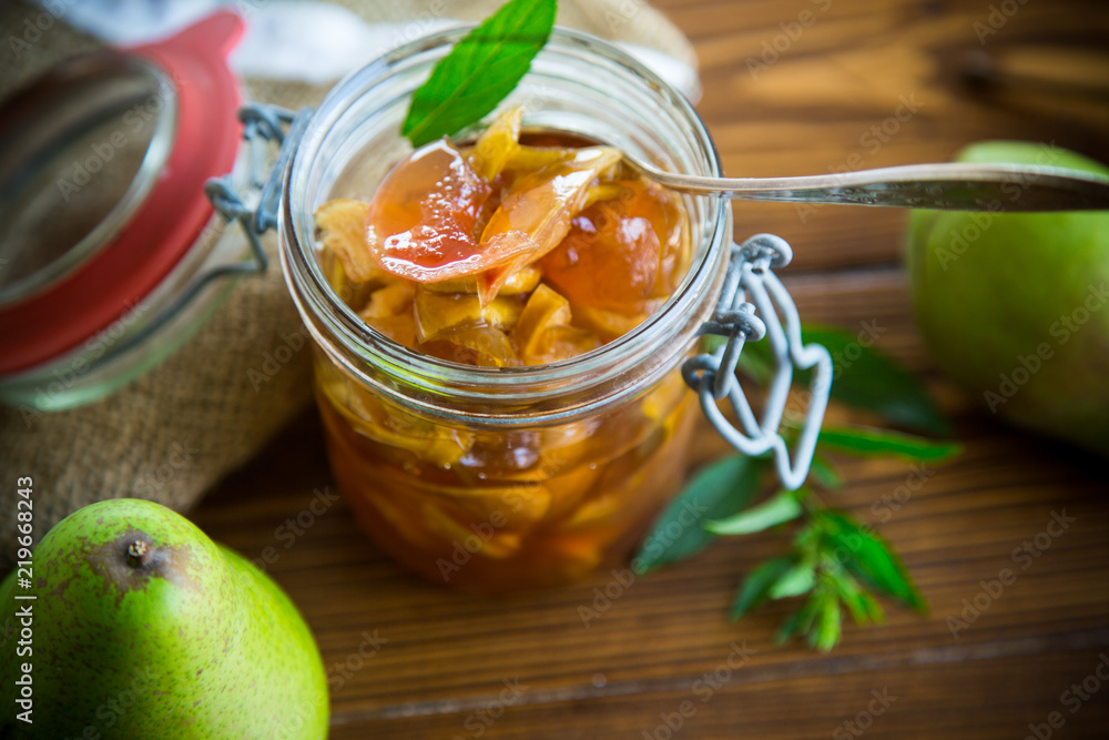 sweet fruit jam with apples and pears in a glass jar sweet fruit jam with apples and pears in a glass jar