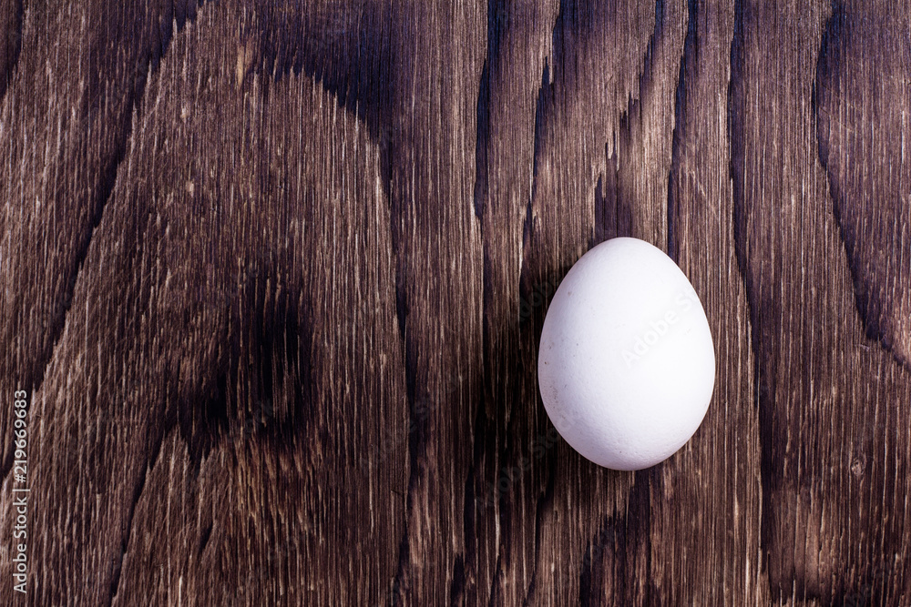 Happy Easter. Top view whole white eggs on old wooden rustic background. Copy space for text Happy Easter. Top view whole white eggs on old wooden rustic background. Copy space for text