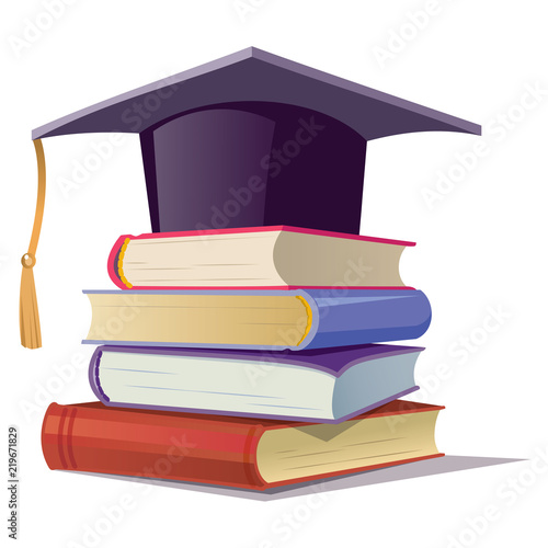 Graduate hat on the books