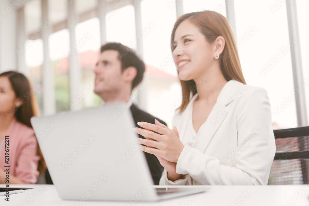 Happy business people clapping their hands, congratulation and appreciation concepts Happy business people clapping their hands, congratulation and appreciation concepts