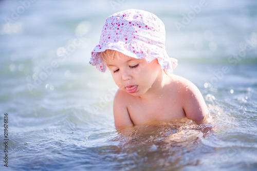 Adorable child on a beach © Lena May