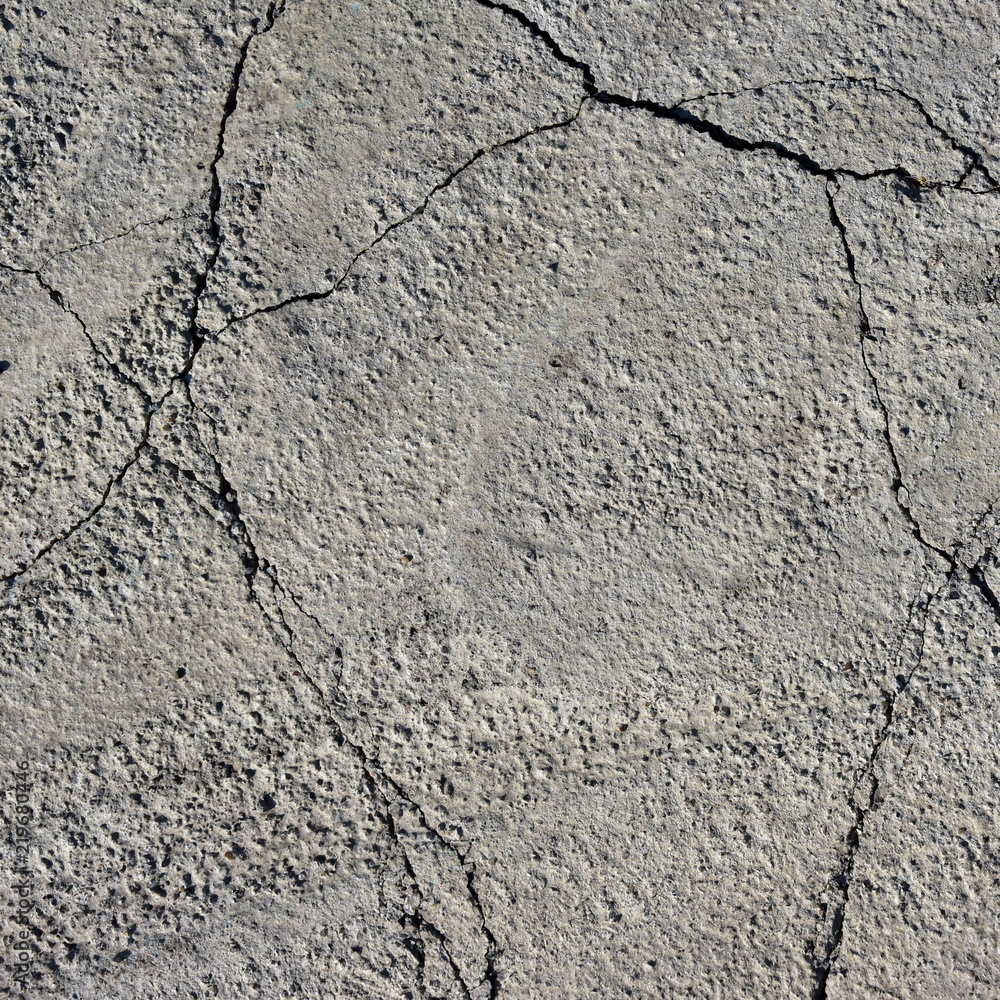 Obraz premium Close up of cracked concrete floor texture. Square neutral background for instagram