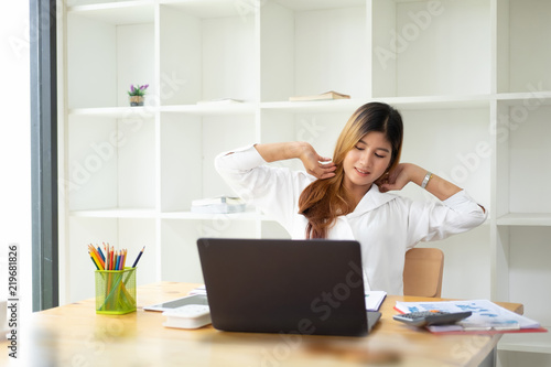 Businesswoman relaxing at chair hands happy asian woman resting in office satisfied after working done.