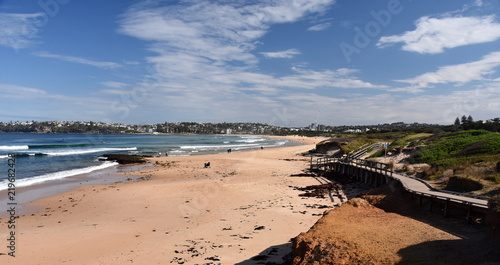 View of Dee Why beach (Sydney, Australia) on a sunny but cold day in winter time. © katacarix