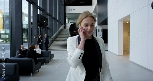 Business woman talking on phone