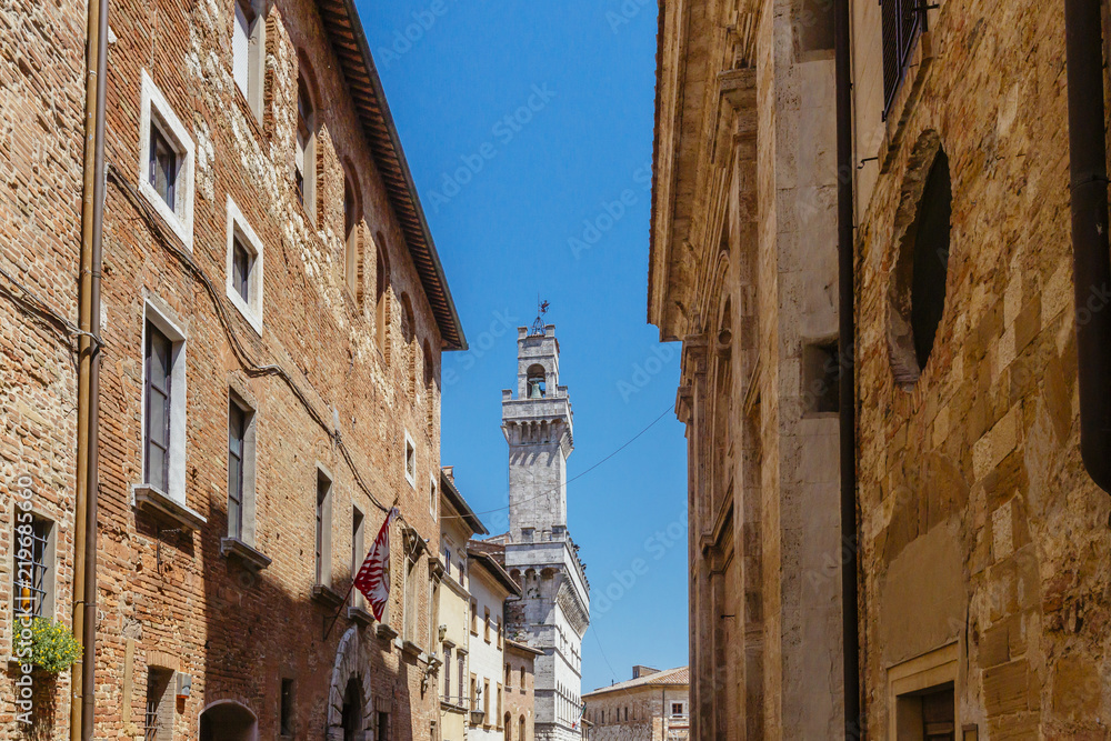 Street of Montepulciano, Italy and the Tower of Palazzo Comunale