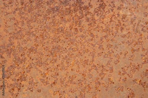 Rusty metal surface background light colored empty space