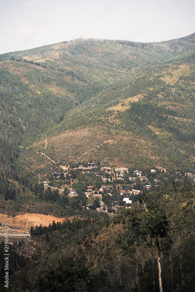 A scenic view of homes on the mountain side in West Vail, Colorado. 
