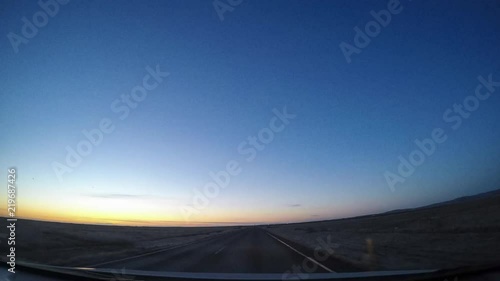 Driving on the beautiful roads of Iceland. Freedom concept. Traveller lifestyle. Wide angle lens time lapse video.