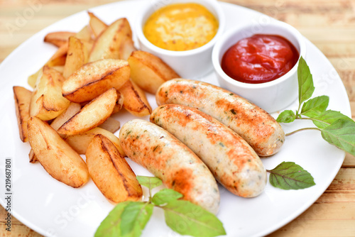 Bavarian sausages. German cuisine. A dish of chicken meat.