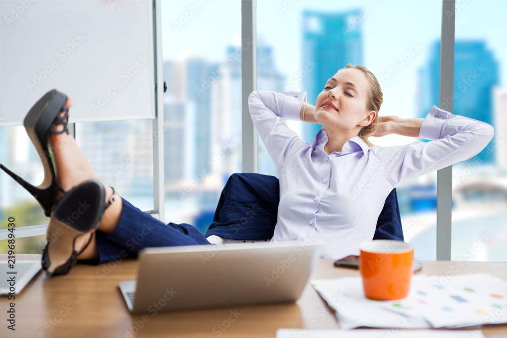 Closeup Image Of Businesswoman Resting Feet Under Desk Stock Photo, Picture  and Royalty Free Image. Image 100729228.