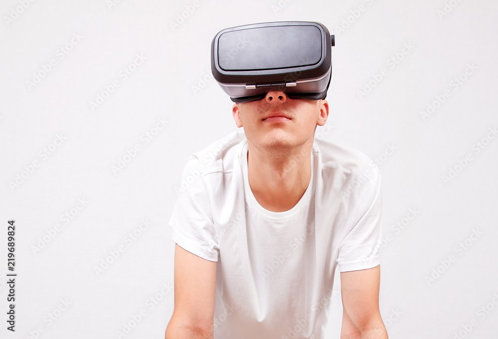Young Man in VR Glasses Young Man in VR Glasses