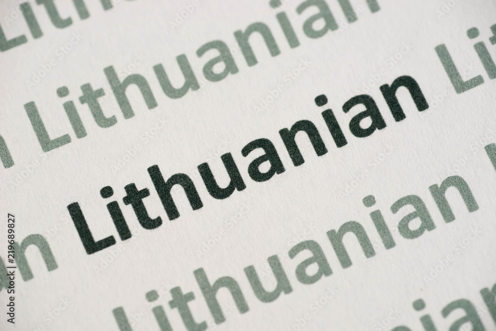 word Lithuanian language printed on paper macro