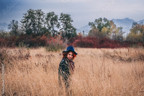 Woman walks in a park