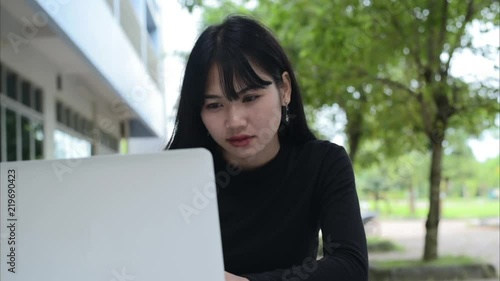 Happy woman feeling excited looking at laptop screen sitting at workplace, celebrates business success, online win, positive good news in email, positive result, passed exam, got job, being promoted